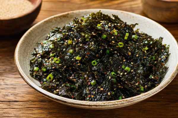 Finished Gim Muchim Seasoned Seaweed presented in a warm Korean dining setting.